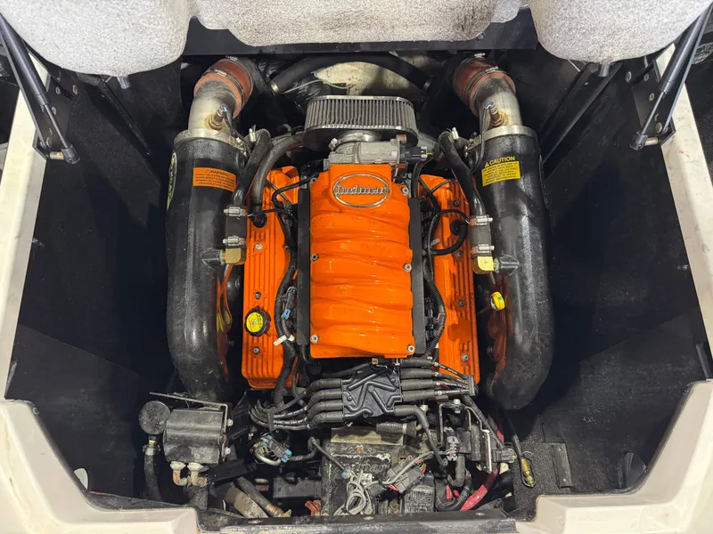 Slide: The Image of 2014 Tigé Z1 engine with orange Indmar logo. - 26