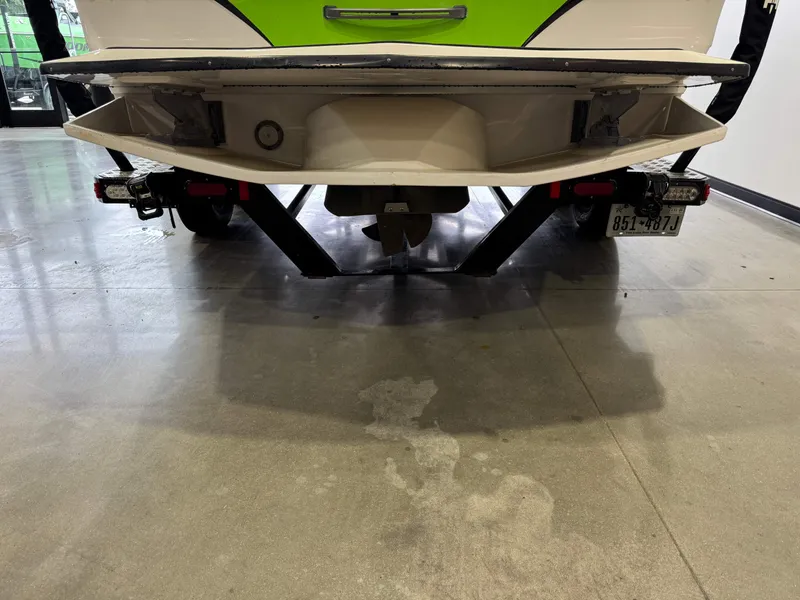 Slide: The Image of Rear view of a 2014 Tigé Z1 boat on a trailer. - 6