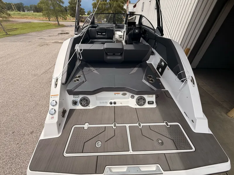 Slide: The Image of Interior of a 2026 Scarab 285 LX boat with modern seating. - 15