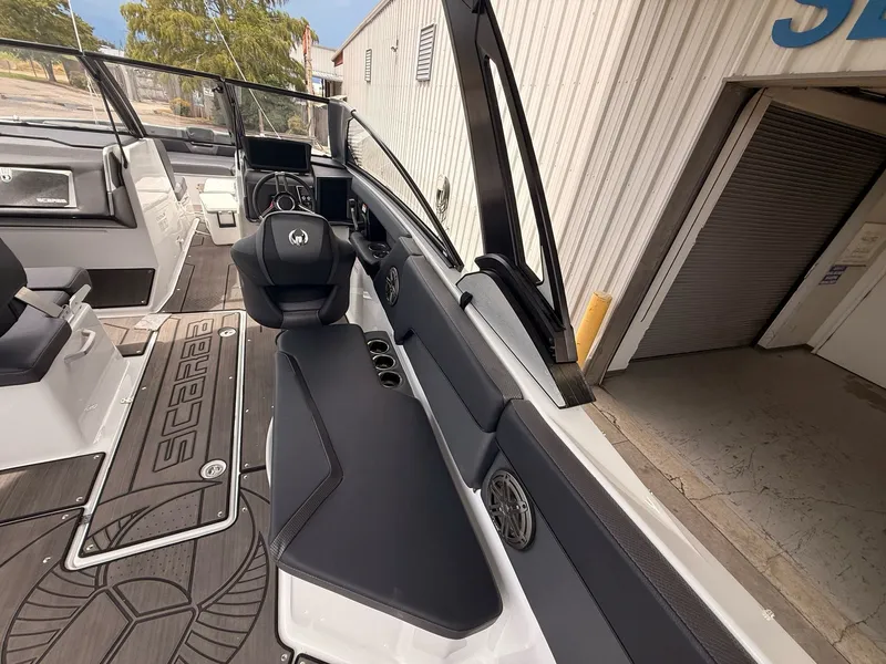Slide: The Image of Interior of 2026 Scarab 285 LX with modern seating and helm console. - 17