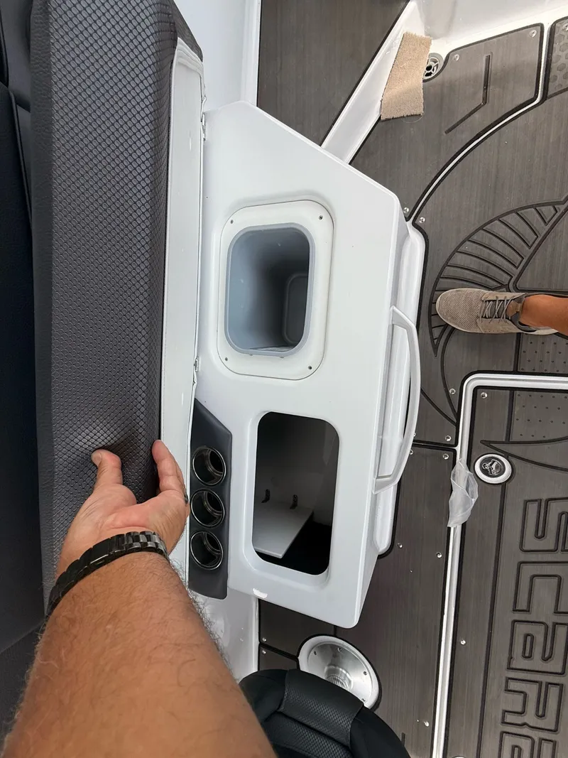 Slide: The Image of Interior of 2026 Scarab 285 LX with storage and seating area. - 25