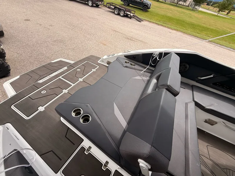 Slide: The Image of Interior of a 2026 Scarab 285 LX boat with modern seating. - 29