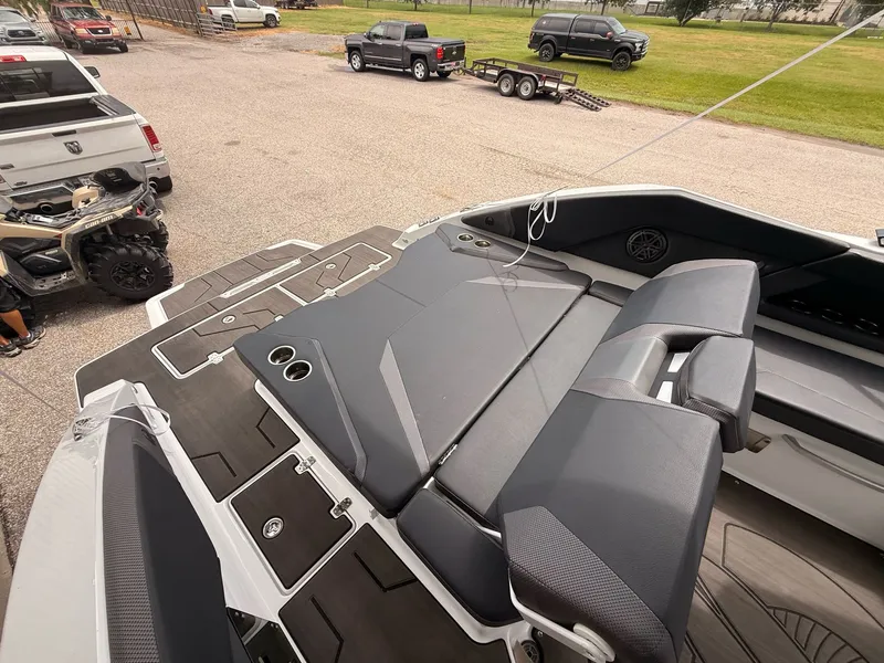Slide: The Image of Scarab 285 LX 2026 boat with stylish deck design. - 30