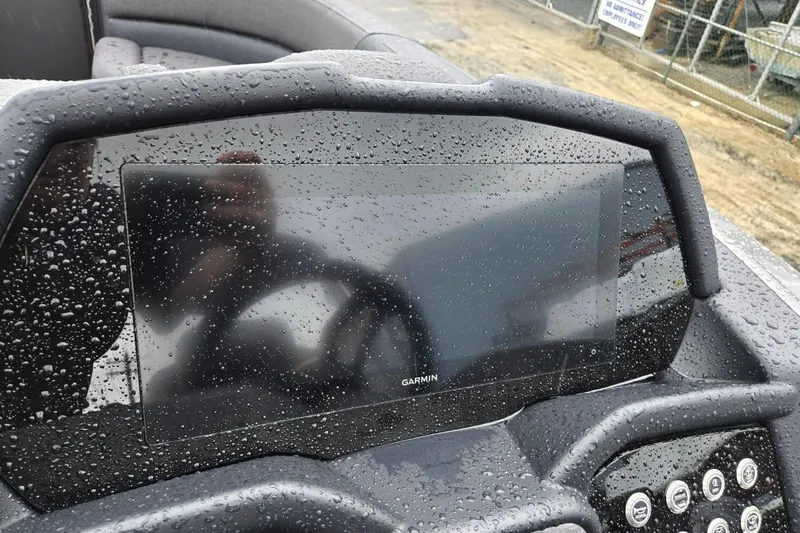 Slide: The Image of Raindrops on Garmin display of 2026 Evotti 721QL boat dashboard. - 15