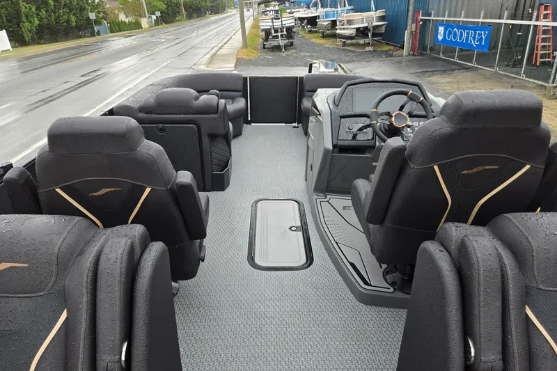 Slide: The Image of Interior of 2026 Evotti 721QL boat with sleek seating and modern dashboard design. - 27
