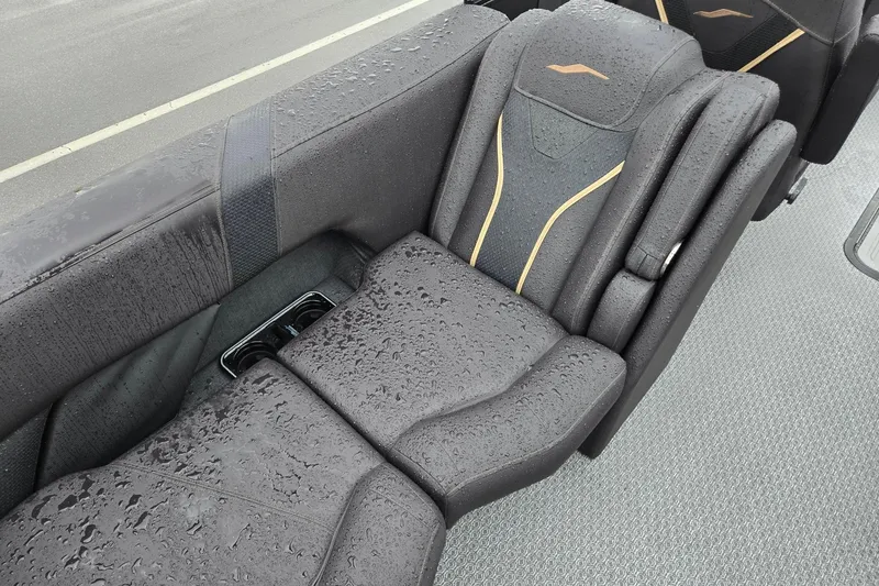 Slide: The Image of Wet black leather seat of 2026 Evotti 721QL with gold accents. - 28