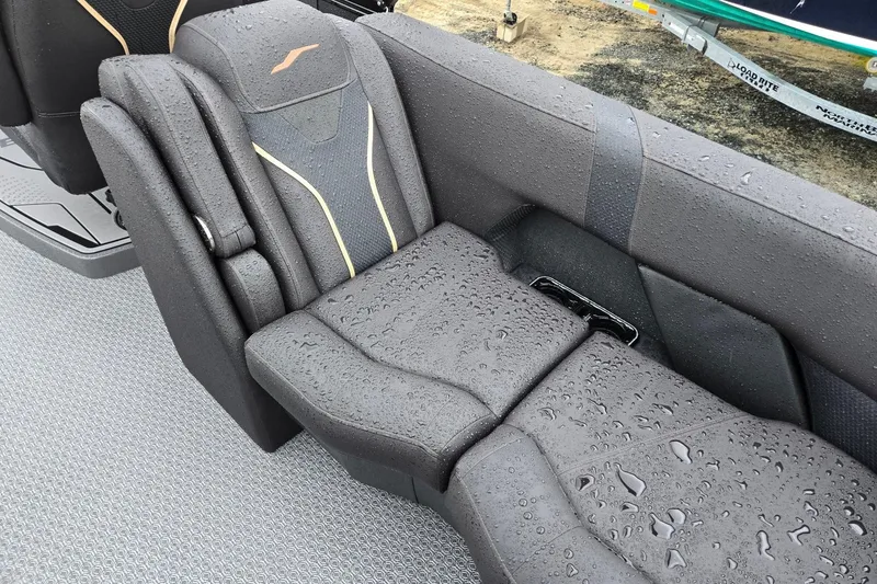 Slide: The Image of Evotti 721QL 2026 boat seat with rain droplets on textured upholstery. - 29