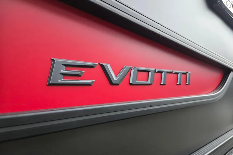 Slide: The Image of Close-up of 2026 Evotti 721QL logo on a red background. - 38