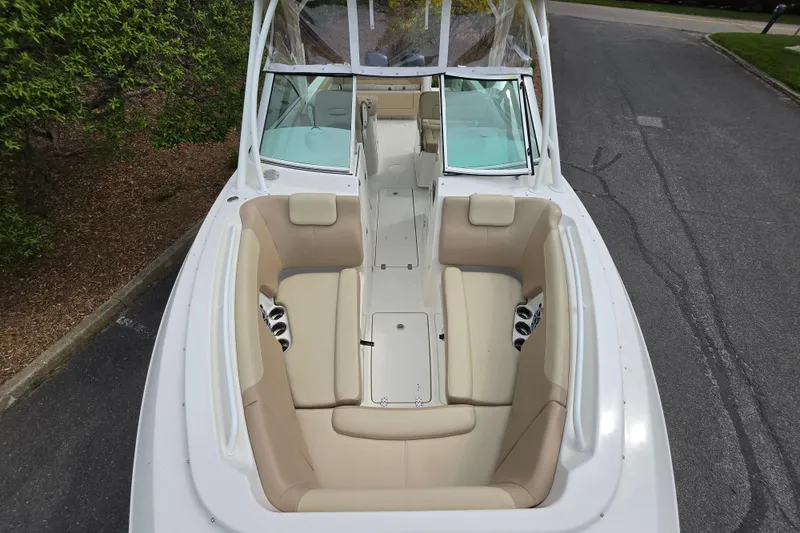 Slide: The Image of 2019 Sailfish 275 DC boat with spacious seating and sleek design. - 12
