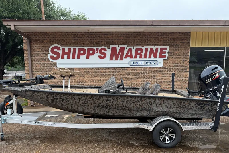 The Image of 2026 Xpress H18C Crappie boat on trailer at Shipp's Marine dealership. - 1