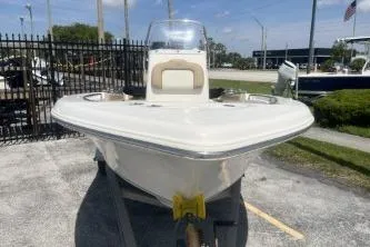 Slide: The Image of 2014 Key West 189 FS boat on trailer, parked outdoors. - 3