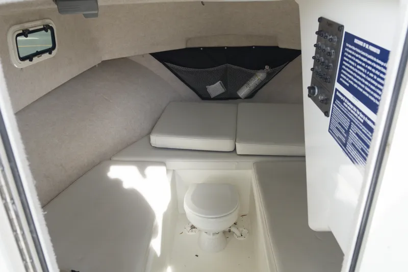 Slide: The Image of 2020 Parker 2810 XLD Walkaround cabin interior with seating and toilet. - 14