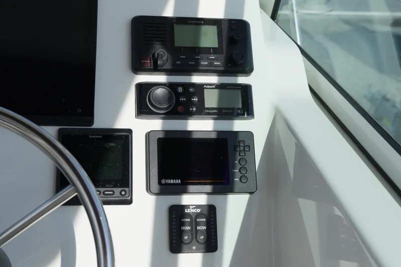 Slide: The Image of Control panel of 2020 Parker 2810 XLD Walkaround boat with navigation and audio systems. - 21