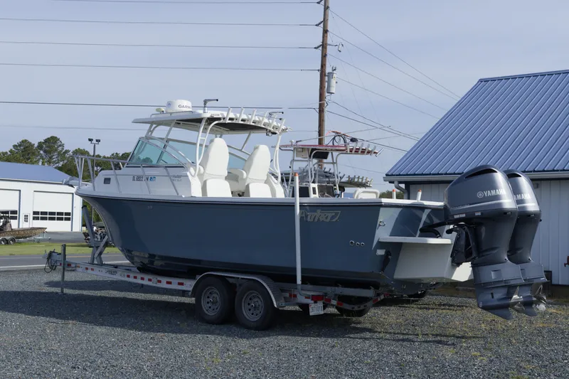 Slide: The Image of 2020 Parker 2810 XLD Walkaround boat on trailer with Yamaha engines. - 4