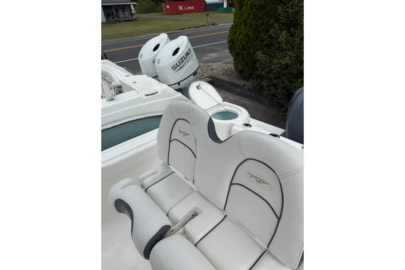 Slide: The Image of 2015 Tidewater 232 CC Adventure boat with Suzuki engines and comfortable seating. - 8