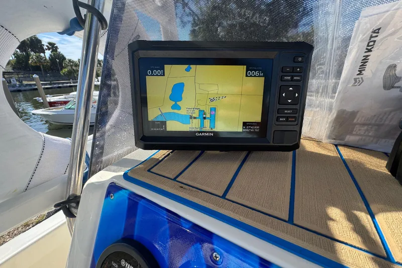 Slide: The Image of Garmin GPS on 2005 Scout 175 Sportfish boat, docked near marina. - 9