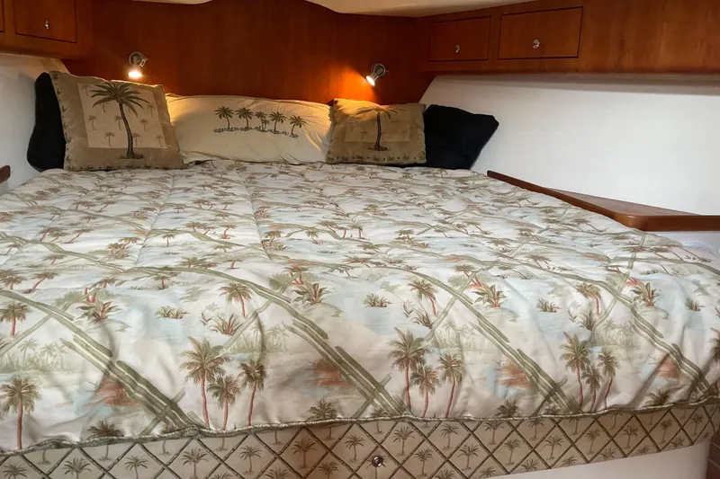 Slide: The Image of Cozy cabin bed in 2004 Rivolta PT Runner 4.0 with palm tree bedding. - 25