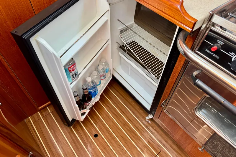 Slide: The Image of Open fridge in 2007 Hunter 41 Deck Salon yacht kitchen, stocked with drinks. - 10