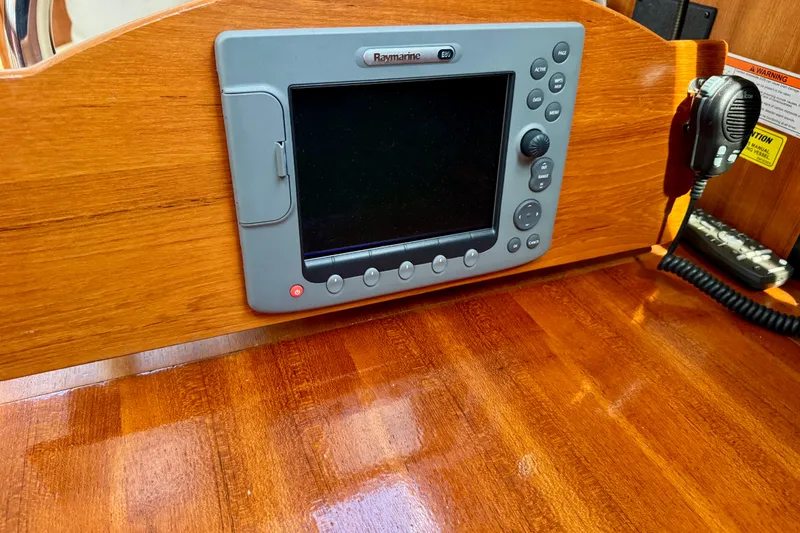 Slide: The Image of Navigation system on 2007 Hunter 41 Deck Salon yacht, featuring Raymarine display. - 17
