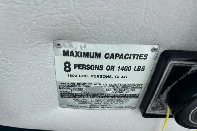 Slide: The Image of Capacity plate on 1994 Sea Ray 240 boat, max 8 persons or 1400 lbs. - 21
