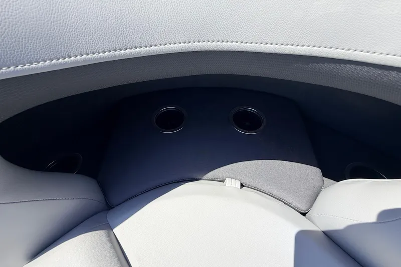 Slide: The Image of Interior seating with cup holders on 2026 Sun Tracker Party Barge 22 DLX. - 24
