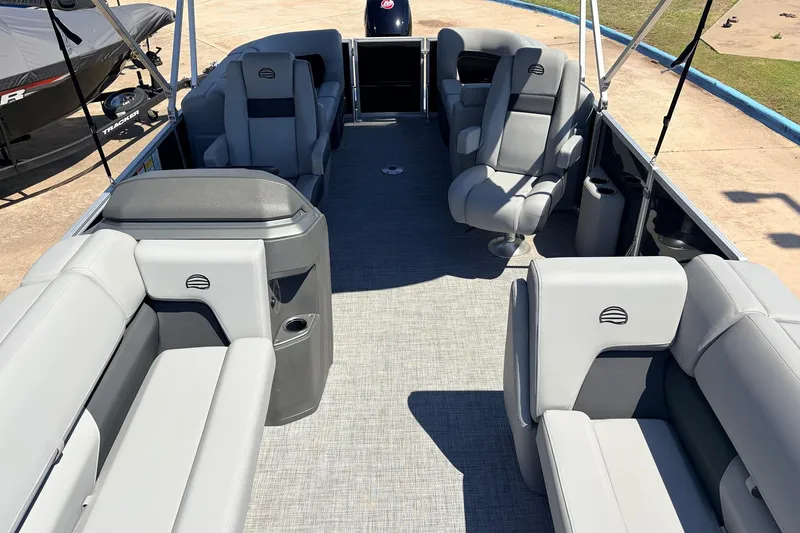 Slide: The Image of 2026 Sun Tracker Party Barge 22 DLX interior with spacious seating and modern design. - 26