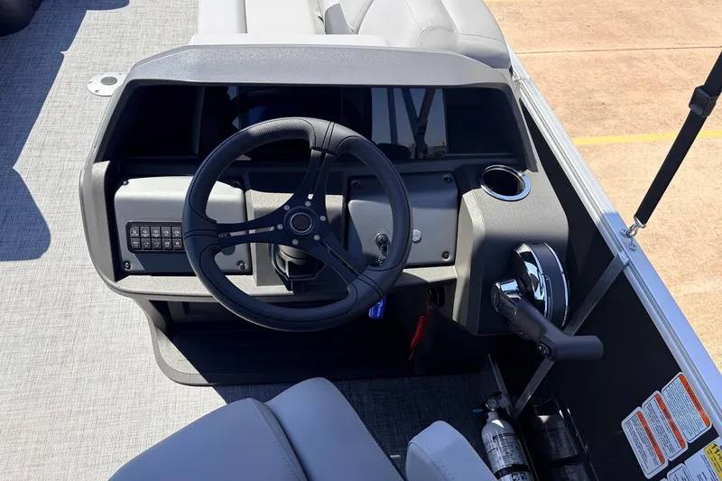 Slide: The Image of Steering console of 2026 Sun Tracker Party Barge 22 DLX pontoon boat. - 32