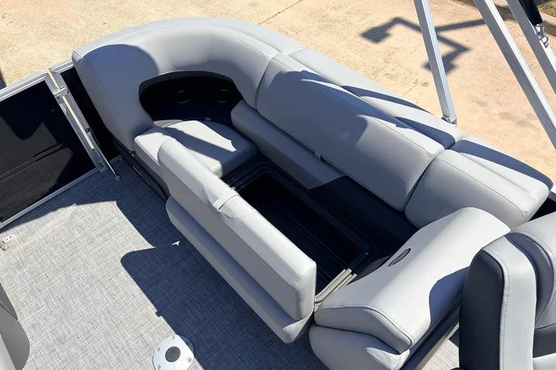 Slide: The Image of 2026 Sun Tracker Party Barge 22 DLX with luxurious gray seating and spacious deck. - 39