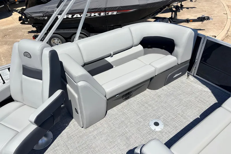 Slide: The Image of 2026 Sun Tracker Party Barge 22 DLX interior with gray seating and modern design. - 43