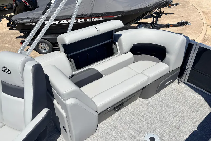 Slide: The Image of 2026 Sun Tracker Party Barge 22 DLX interior with comfortable seating and modern design. - 44