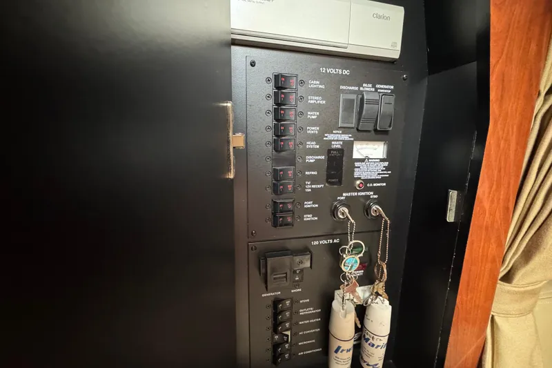 Slide: The Image of Electrical control panel on a 2007 Sea Ray Sundancer 320 boat. - 16