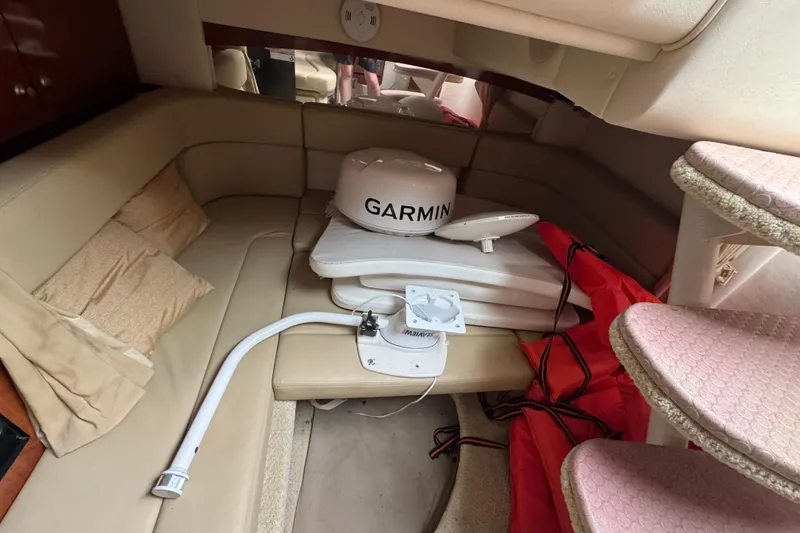 Slide: The Image of Interior of 2007 Sea Ray Sundancer 320 with Garmin equipment and beige seating. - 17