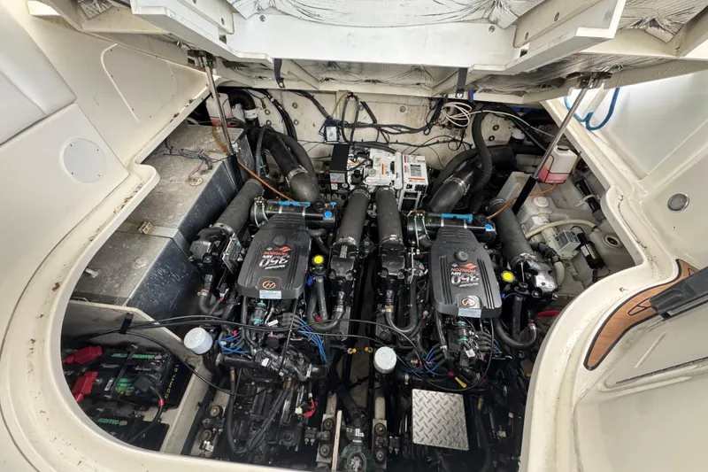 Slide: The Image of Engine compartment of 2007 Sea Ray Sundancer 320 with dual engines. - 18
