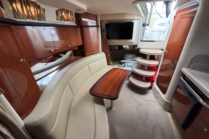 Slide: The Image of Luxurious interior of a 2007 Sea Ray Sundancer 320 yacht with elegant wood finishes. - 3