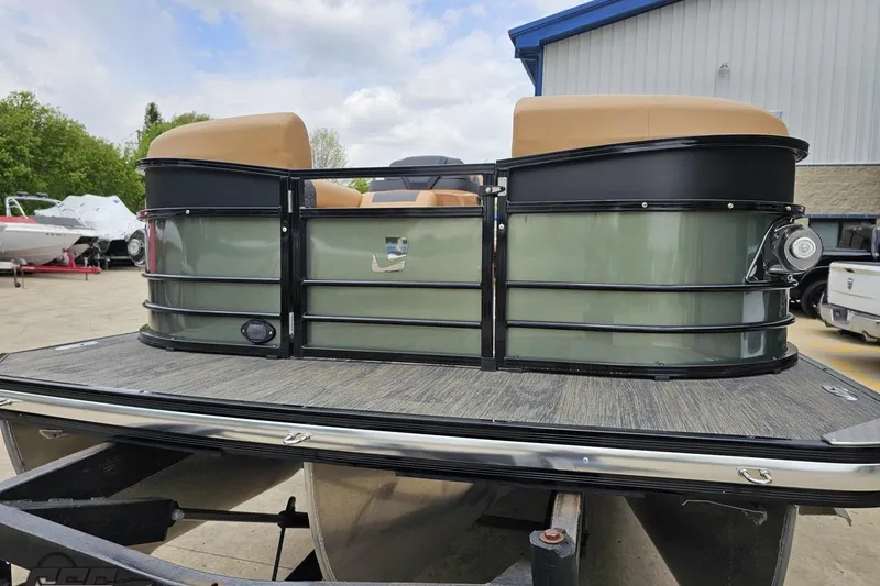 Slide: The Image of 2026 Landau Signature 25C pontoon boat at a marina, showcasing sleek design and modern features. - 18