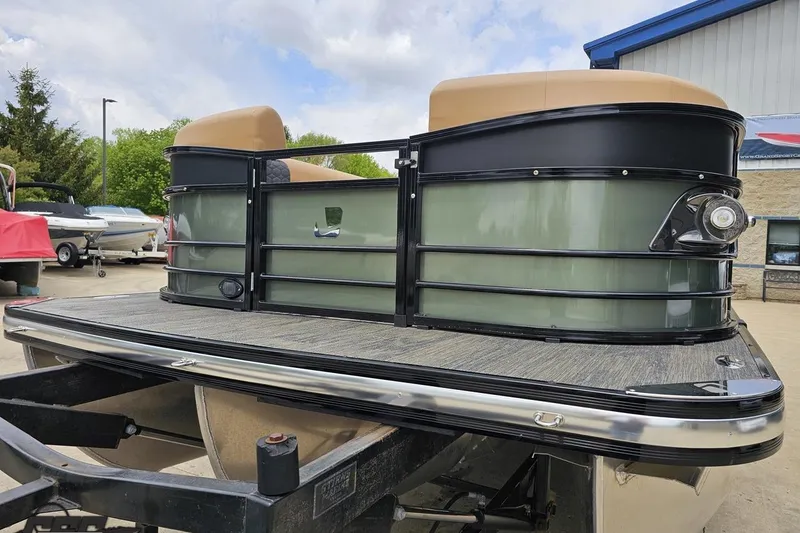 Slide: The Image of 2026 Landau Signature 25C pontoon boat on trailer, showcasing sleek design and modern features. - 19