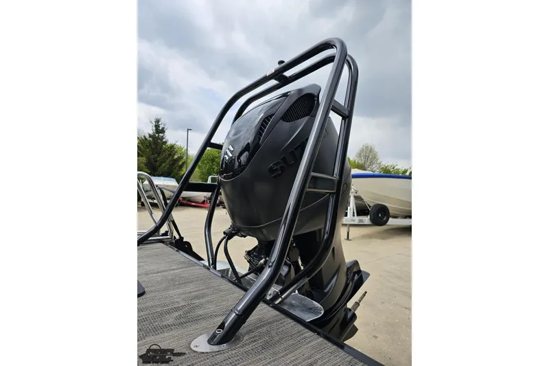 Slide: The Image of 2026 Landau Signature 25C boat engine with protective frame, parked outdoors. - 30