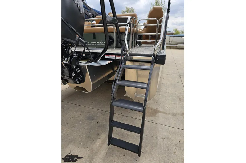 Slide: The Image of Rear view of 2026 Landau Signature 25C boat with boarding ladder and seating. - 34