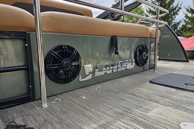 Slide: The Image of 2026 Landau Signature 25C pontoon boat with speakers and cushioned seating. - 39