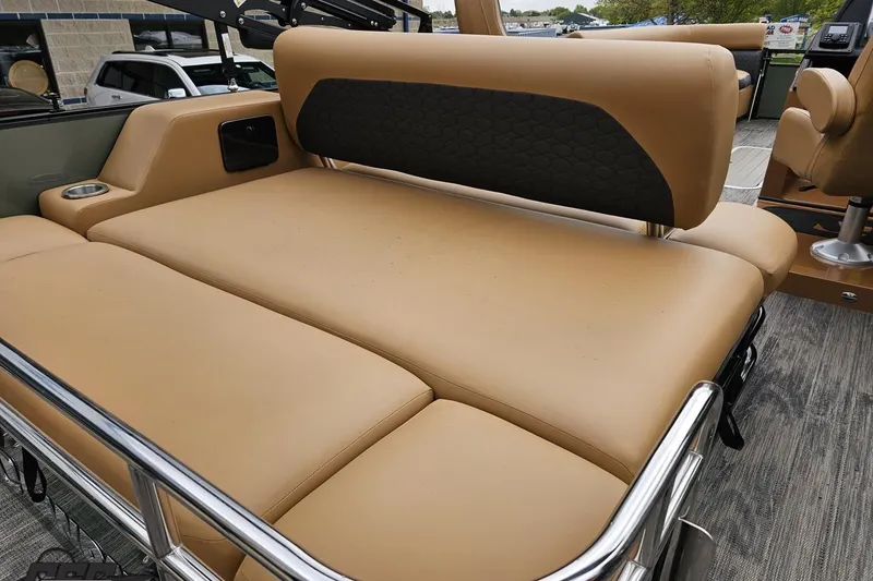 Slide: The Image of Luxurious tan seating on 2026 Landau Signature 25C pontoon boat, featuring sleek design and comfort. - 41