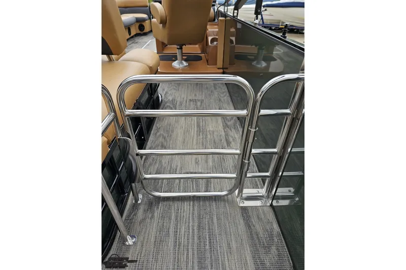 Slide: The Image of Interior of 2026 Landau Signature 25C pontoon boat with chrome gate and seating. - 42