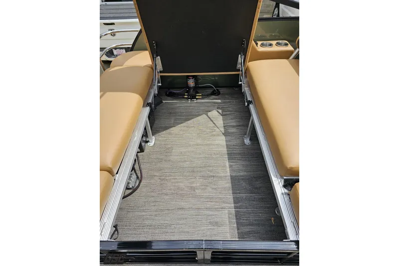 Slide: The Image of Interior of 2026 Landau Signature 25C boat with tan seating and carpeted flooring. - 45