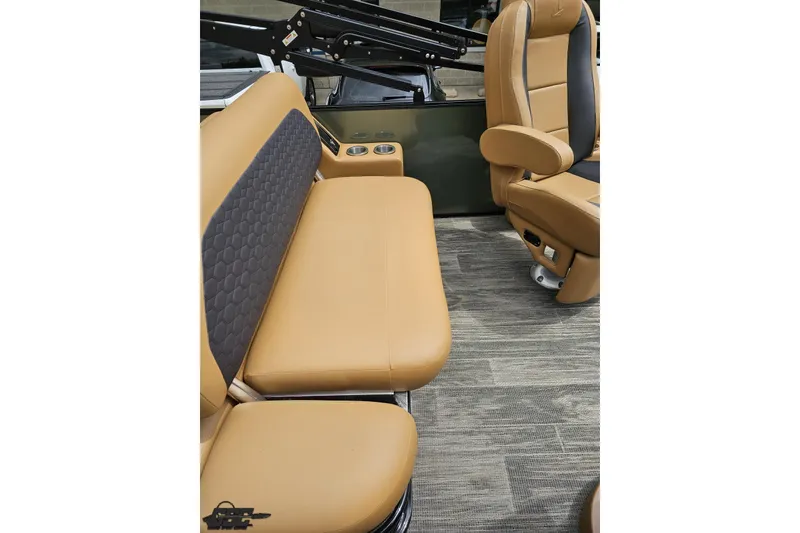 Slide: The Image of 2026 Landau Signature 25C interior with tan leather seating and modern design. - 47