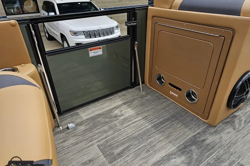 Slide: The Image of Interior of 2026 Landau Signature 25C boat with tan seating and modern design. - 57