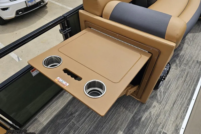 Slide: The Image of Foldable table with cup holders in 2026 Landau Signature 25C boat interior. - 58