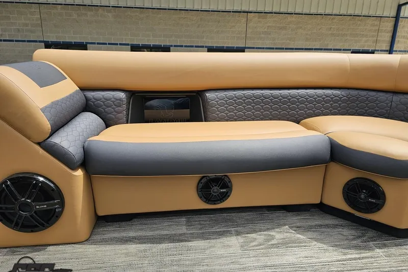 Slide: The Image of Luxurious seating on 2026 Landau Signature 25C boat with premium speakers and elegant design. - 65