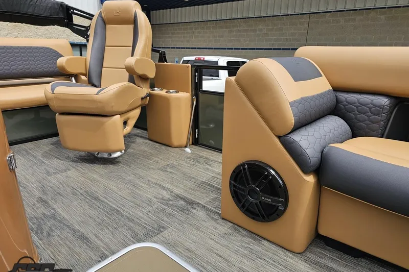 Slide: The Image of Luxurious interior of 2026 Landau Signature 25C pontoon boat with plush seating and modern design. - 66