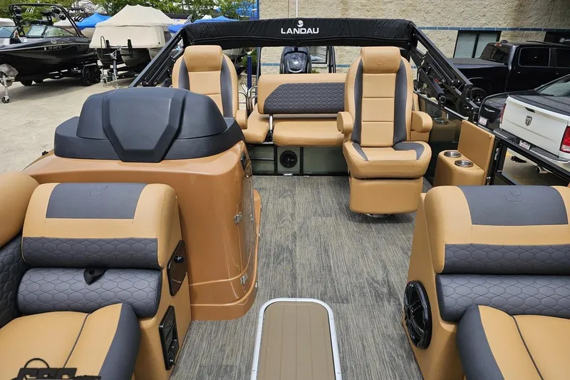 Slide: The Image of Interior of 2026 Landau Signature 25C pontoon boat with luxurious seating and modern design. - 68