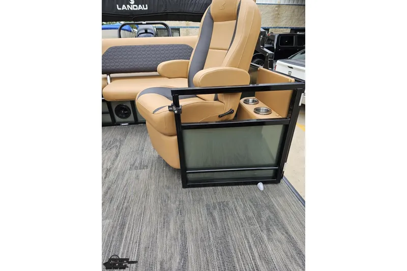 Slide: The Image of Luxurious seating on 2026 Landau Signature 25C pontoon boat with cup holders and modern design. - 72