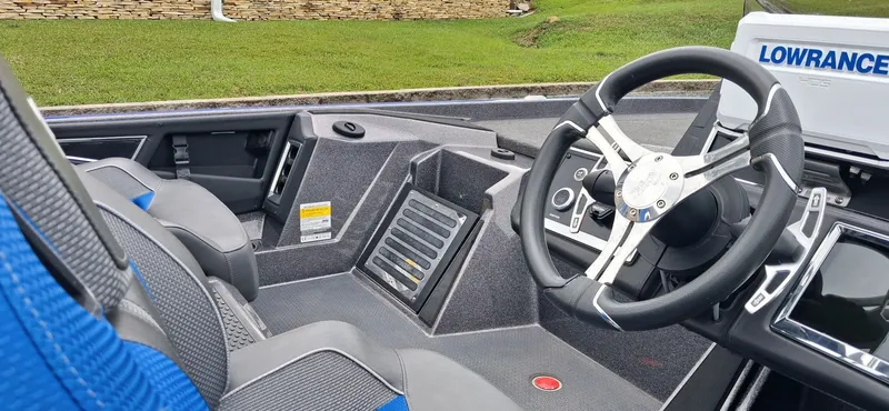 Slide: The Image of Interior of 2024 Ranger Z521R with steering wheel and control console. - 15